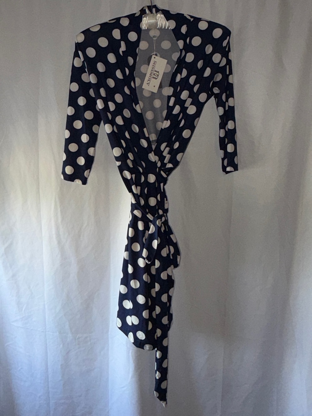 Miss MolyBlue V-neck knee length with white polka dot wrap dress